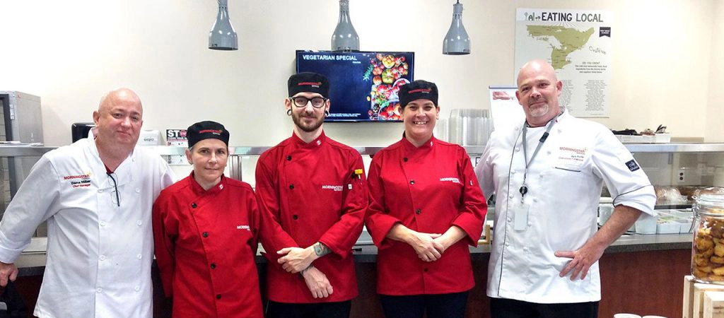 A group of chefs from Morningstar preparing for food services at a client site